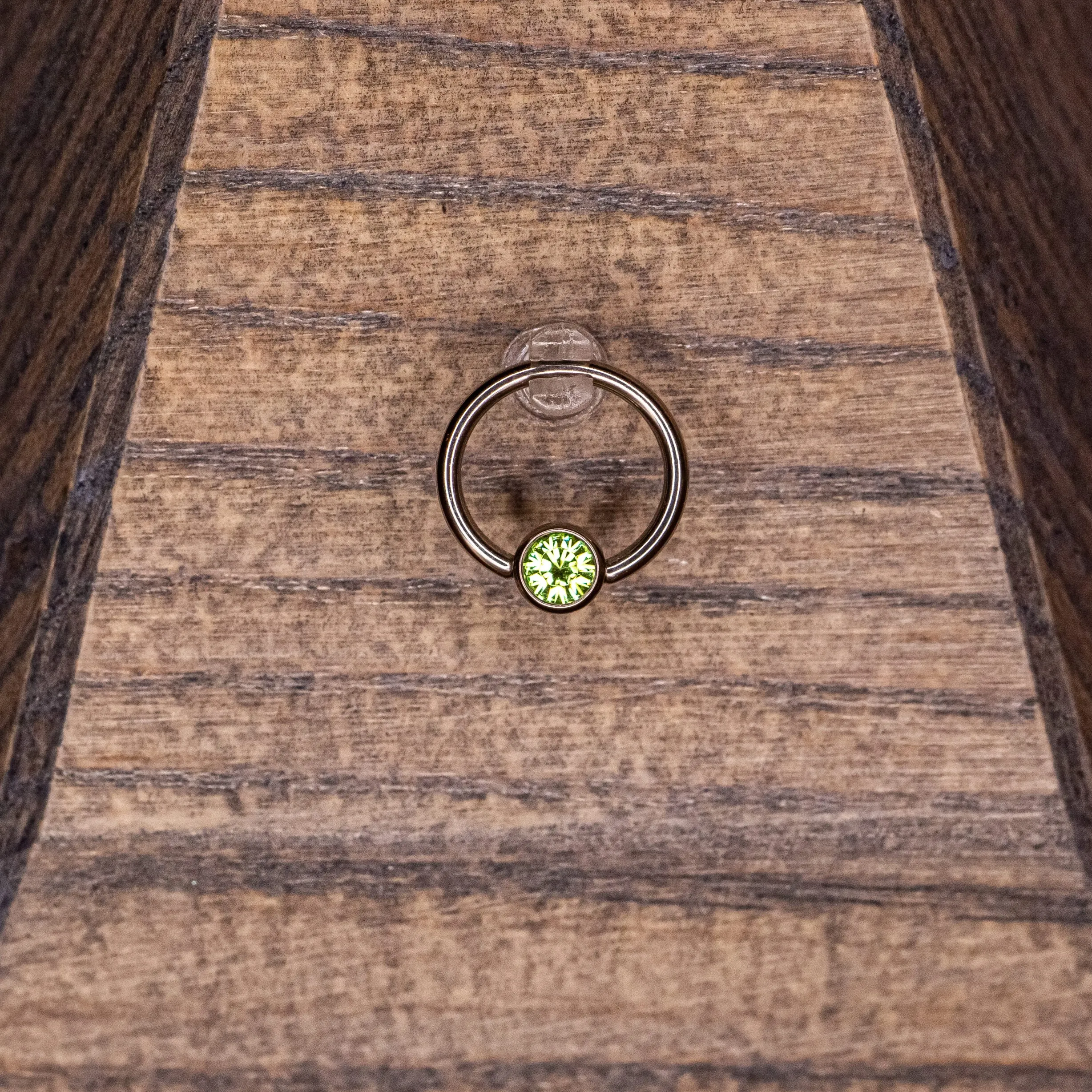 Captive Bead with Light Green Crystal